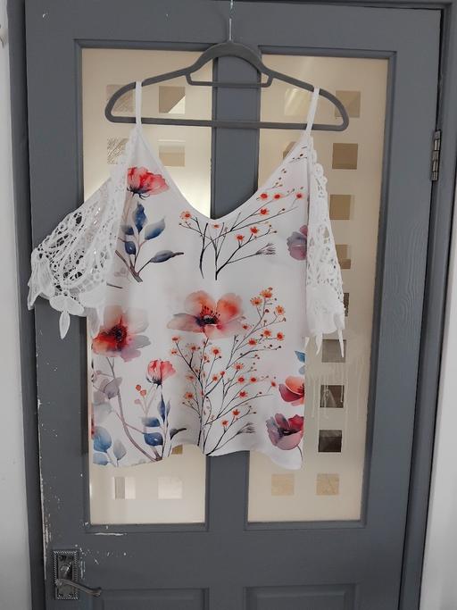  — ladies top