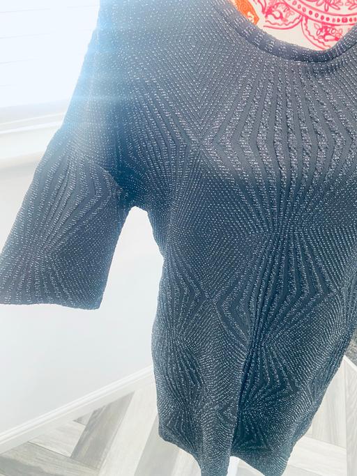  — (12) GEORGE DRESS
