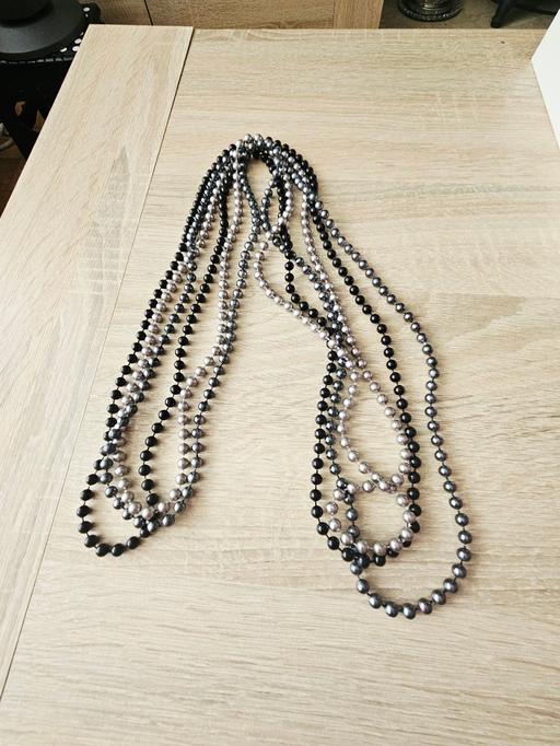  — 3 strand faux pearl necklace