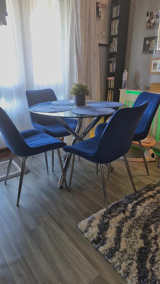  — dinner table and 4 chairs