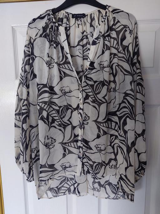  — Women's patterned blouse size 12