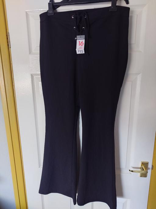  — Women's black trousers size 16