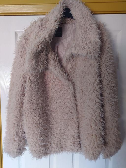  — Women's cream furry coat size 18