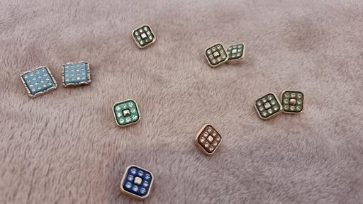  — 10 odd buttons 50p