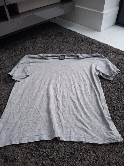  — size medium champion top