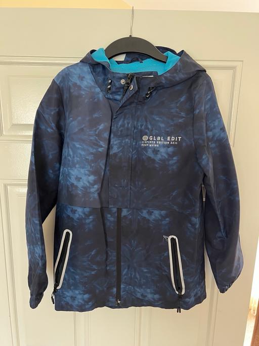  — Boys rain jacket 11-12 years
