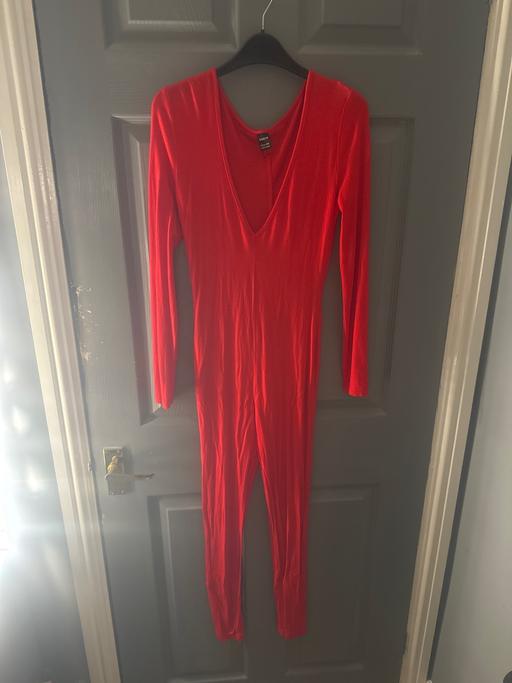  — Red all in one jumpsuit