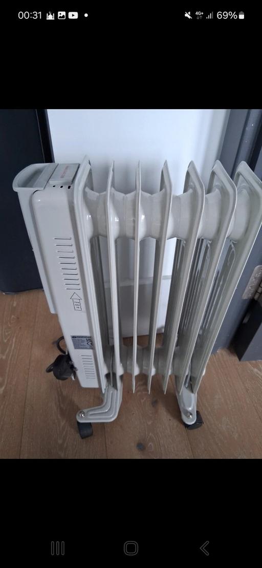  — Daewoo Portable oil-filled electric radiator