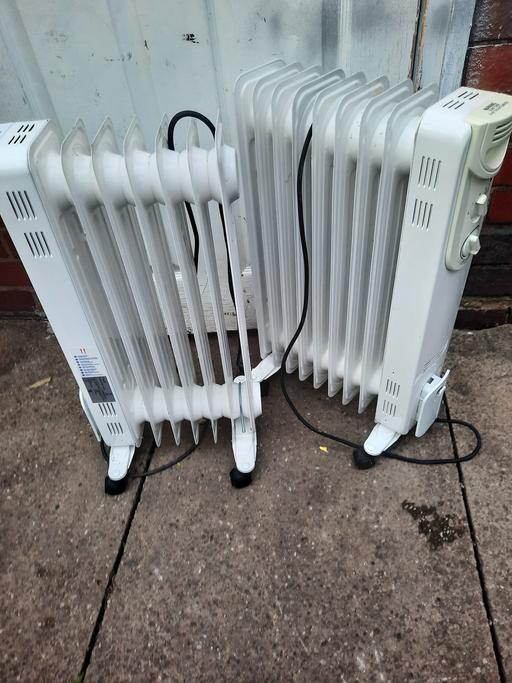  — oil filled radiator x 2