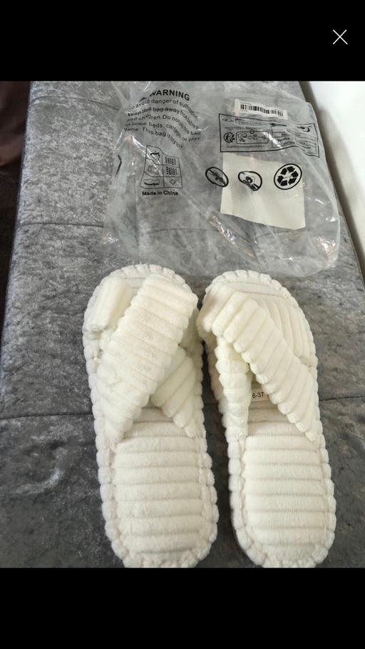 — Slippers