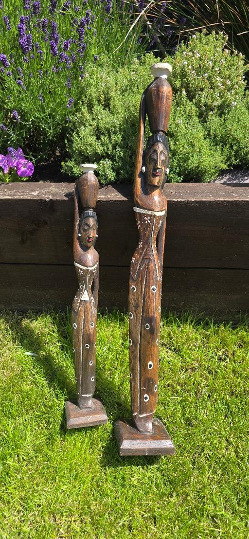  — Wooden statues