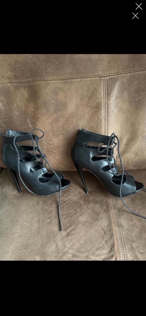  — Black Stilettos Size 4