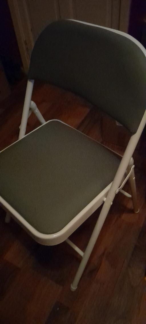  — 4 folding chairs space savers
