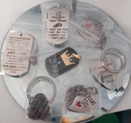  — Stainless steel quote pendants & keyrings