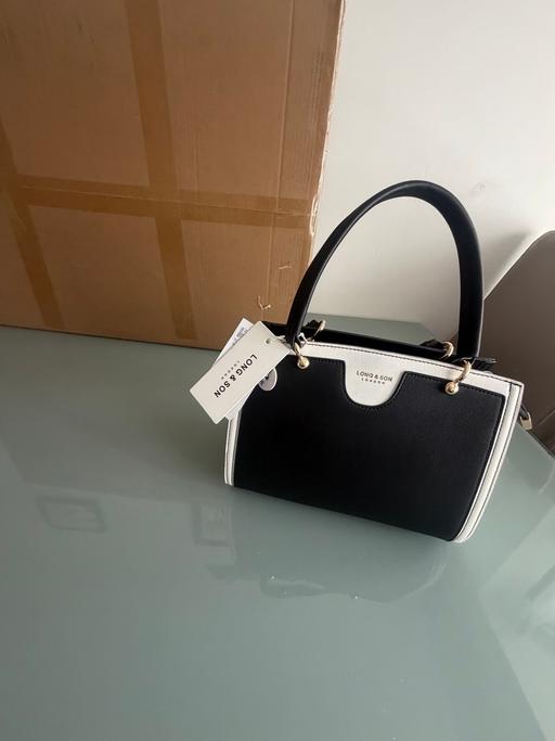  — Lady bag long and son London
