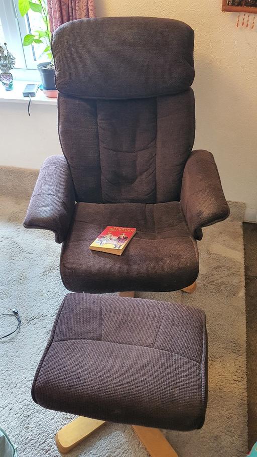 — Swivel recliner chair with footstool
