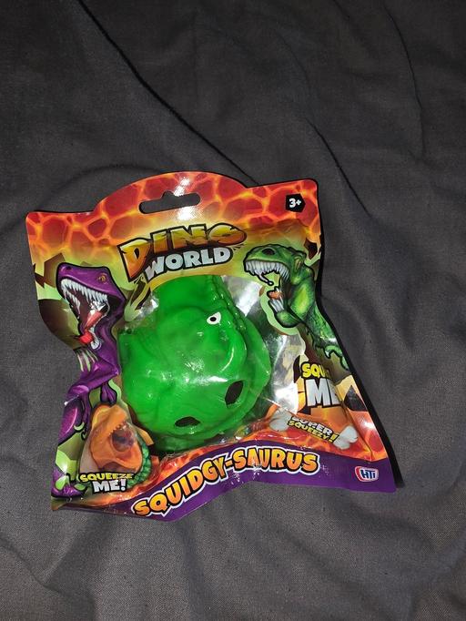  — Dino world squidgy saurus
