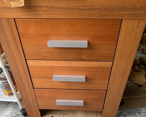  — Brown wooden chest drawer with metal handles