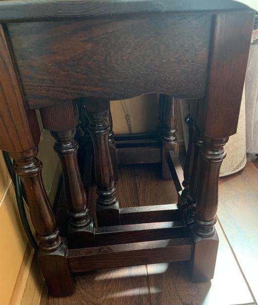  — Three wooden oak dark brown nested new tables