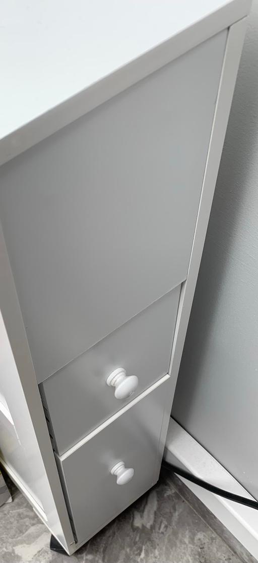  — Thin narrow white cabinet draw display unit