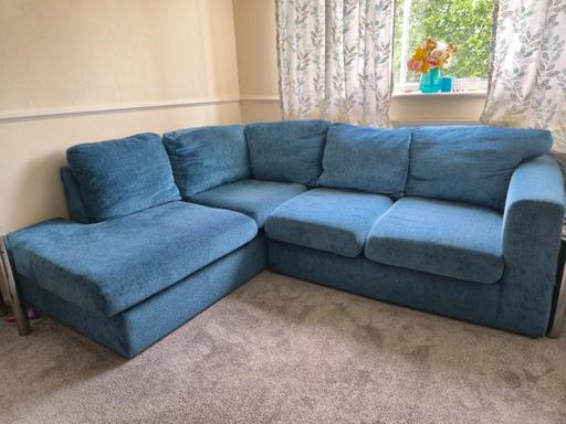  — Teal L-shaped sofa