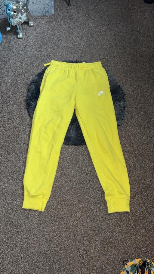 — Yellow Nike bottoms