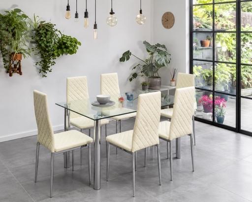  — Glass Dining Table with 6 Cream Padded Chairs