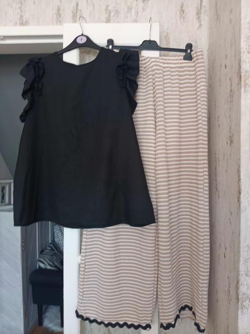  — trousers one size and blouse xxl