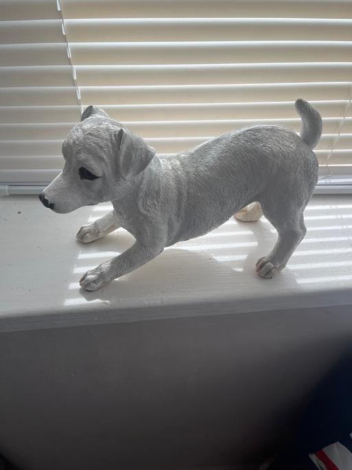  — dog statue