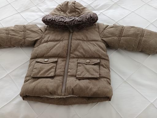  — BABY COAT
