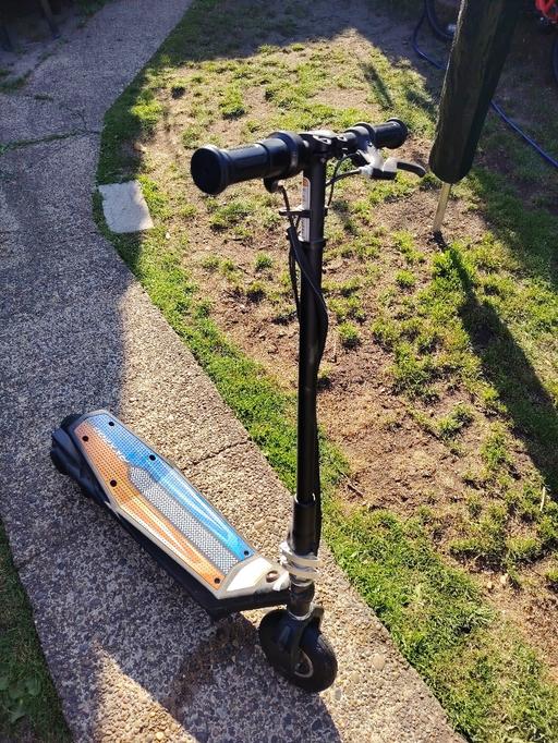  — Electric scooter.