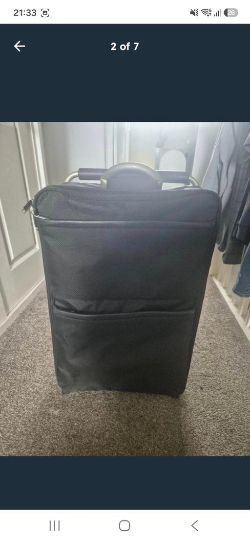  — Suitcase