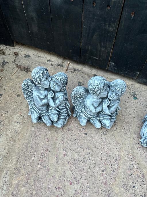  — Two angel concrete statues
