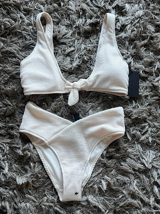  — Newlook cream bikini set siz10