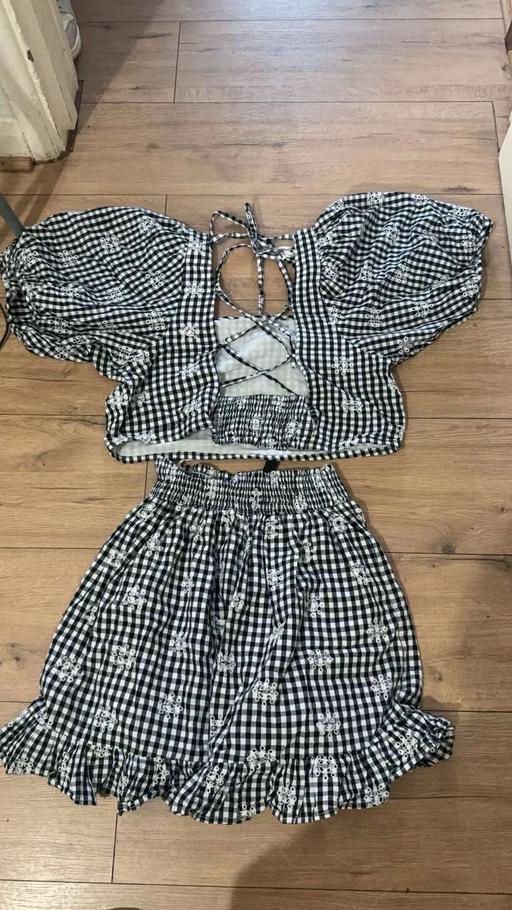  — Skirt and top