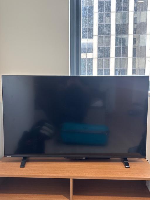  — Toshiba 50 inch TV and remote
