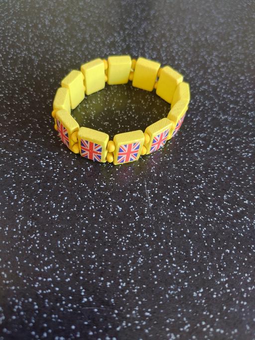  — Yellow union jack wrist band
