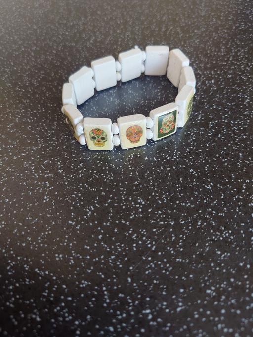  — White skull wristband