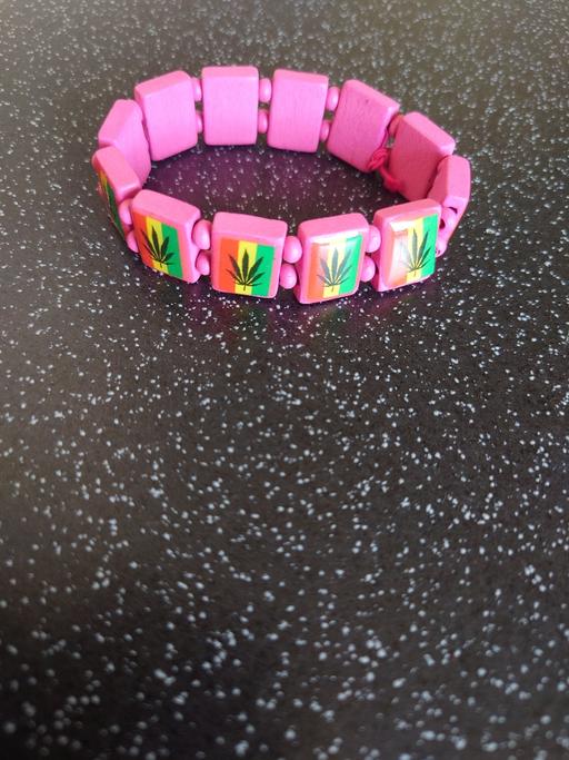  — Pink rasta wrist band