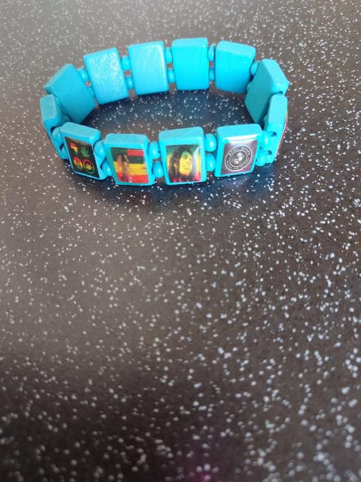  — Turquoise rasta wrist band