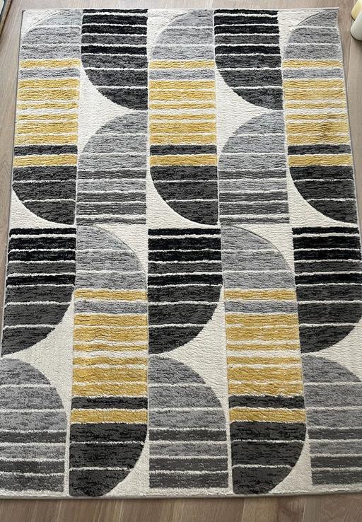  — Rug