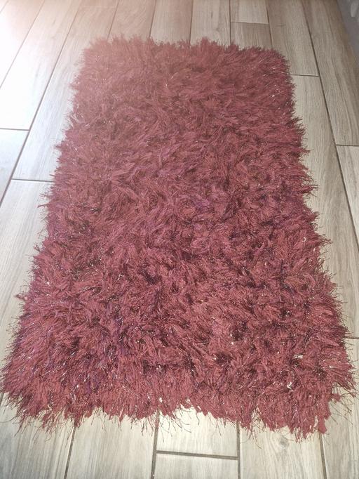  — Burgundy sparkly rug 48" /24"