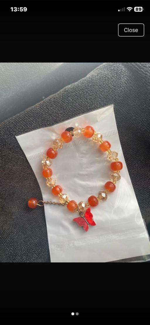  — Orange butterfly bracelet