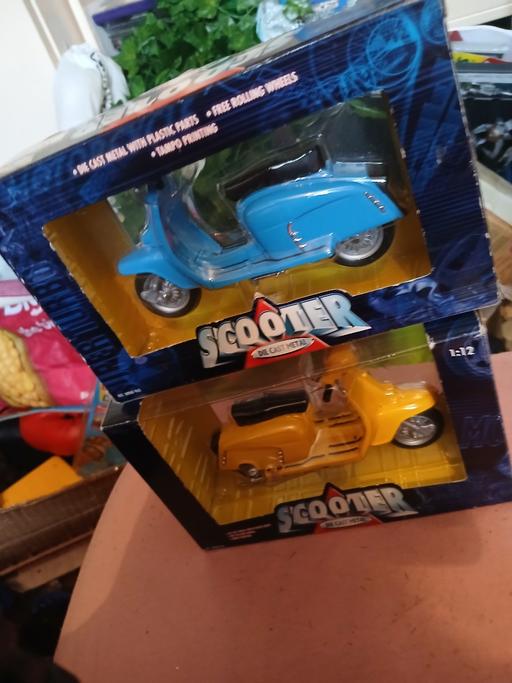  — 2 scooters in boxes new