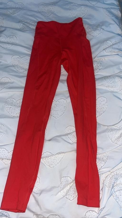  — Red leggings tight with pickets