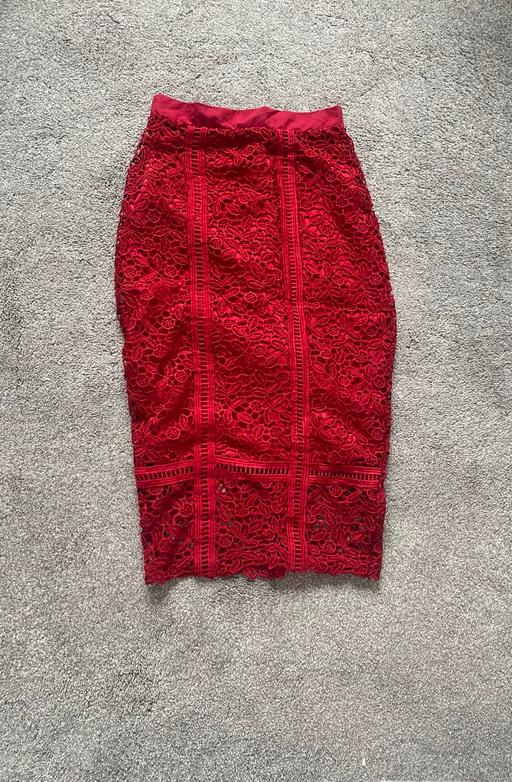  — Red skirt with flower patterns
