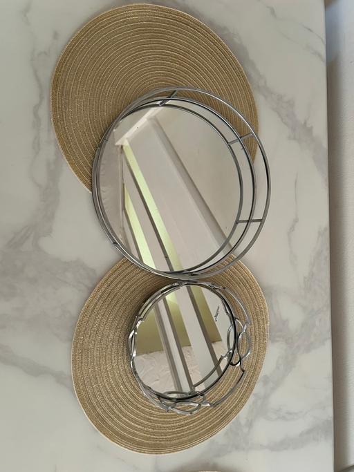  — Two decorative mirrors