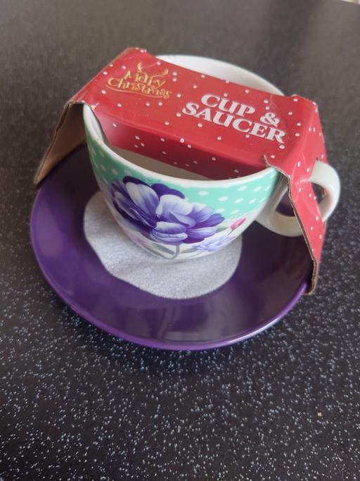  — Purple cup and saucer set