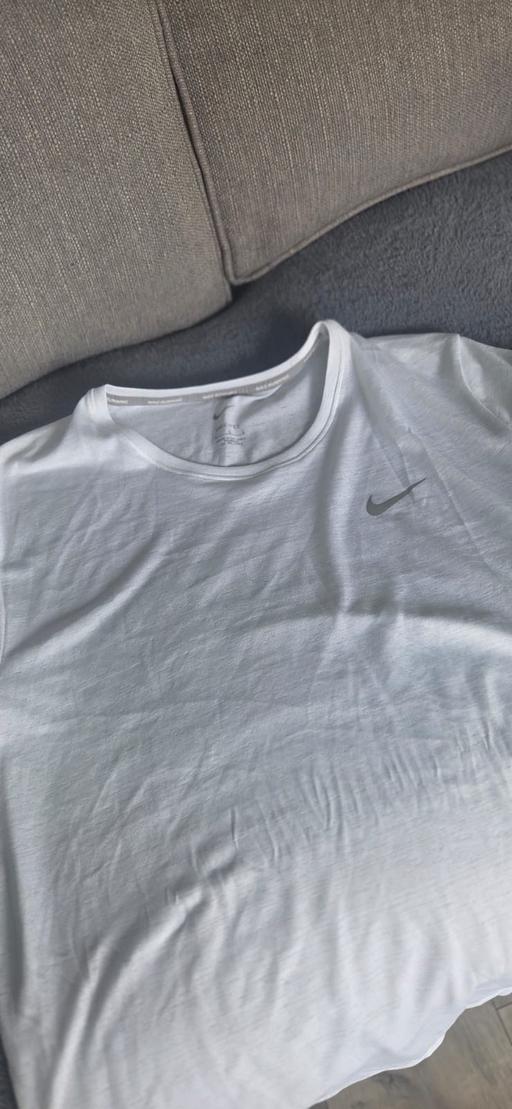  — Nike White running top