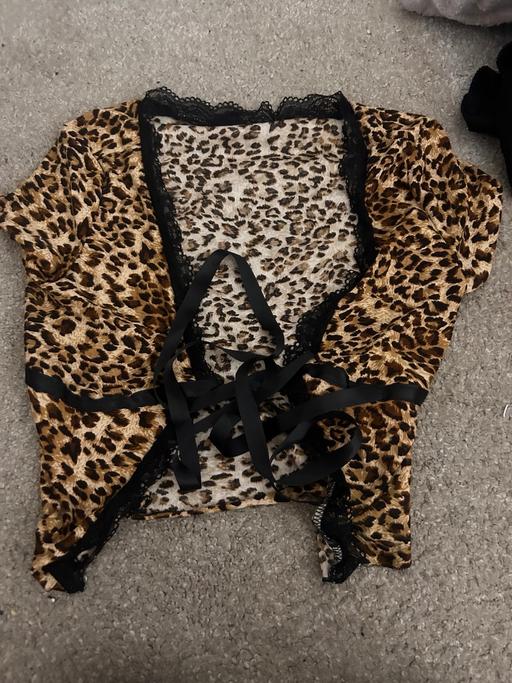  — leapord print tie up top
